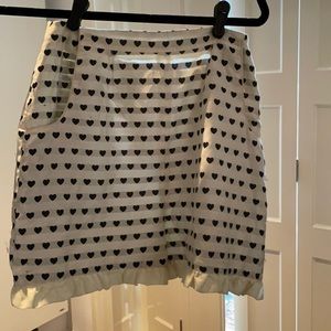 Ysterike sized 38 shorts with heart shaped pattern.